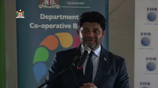 Fijian Attorney-General Aiyaz Sayed-Khaiyum hands over a farming tractor in Nawaka