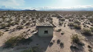 Drone footage of abandoned homestead desert house