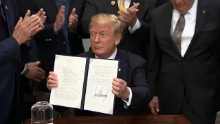 Trump signs space policy directive to send Americans to Moon, Mars