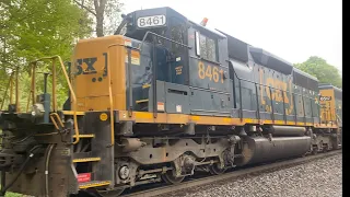 Large CSX M426 starts up after 439 passed with locomotives 123, and 2 EMD switchers 6517, and 8461