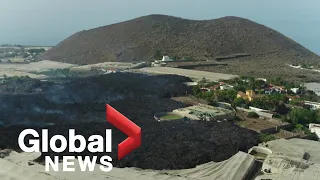 La Palma volcano: Drone footage shows path of devastation as lava makes its way to ocean