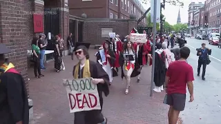 Hundreds of graduates walk out of Harvard commencement chanting 'Free, free Palestine' over Gaza war