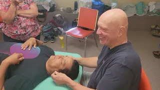 Face massage. Brandon Raynor teaching how to do a face massage.