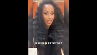 Cardi B  shows off her very long and full natural hair