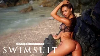 Watch Alexis Ren Get Hit By A Big Wave In Aruba | Sports Illustrated Swimsuit