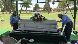 Lowering Dad's casket to its final resting place