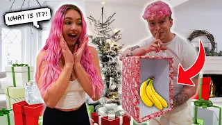 SURPRISING MY GIRLFRIEND WITH BAD CHRISTMAS GIFTS!!! **HILARIOUS REACTION**