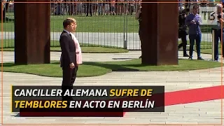 Preocupación por temblores de Angela Merkel en acto público