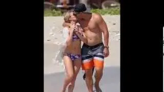 Bikini clad LeAnn Rimes and her shirtless husband Eddie Cibrian kissed on the beach during their rom