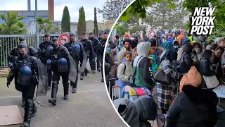 Paris police evict hundreds of migrants ahead of Olympics