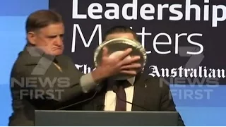 Qantas CEO gets pie shoved in face