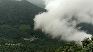 Fog rapidly covering the ghats of Wayanad, Kerala, India. - beautiful and mesmerizing view!