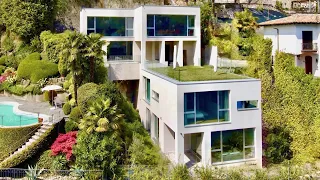 Modern villa for sale in Vico Morcote, in Swiss Ticino with garden, swimming pool & magic lake view