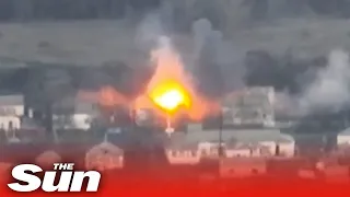 Ukrainian artillery and 'Belarusian volunteers' blow up Russian ammo depot