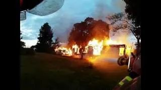 Proctecting exposures on a large farm house fire that burns down rollover flashover backdraft