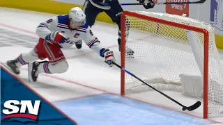 Rangers' Jacob Trouba Makes Unbelievable Diving Stop to Steal Goal From Blue Jackets