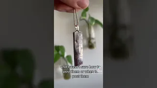 Floofy dog loves crystal moss agate pendants