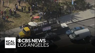 May Day marchers show support for pro-Palestinian encampment at USC