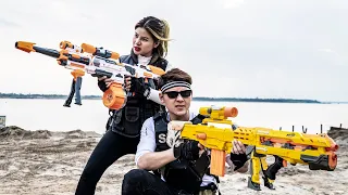 LTT Nerf War : Couple SEAL X Warriors Nerf Guns Fight Crime Dr Lee Invaded And Occupied Villa Area