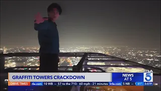 BASE jumper leaps from graffitied towers in downtown L.A.