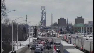 Protesters cut off Canada-bound traffic on the Ambassador Bridge
