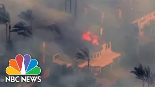 Homes Burn In Fast Moving Southern California Brush Fire