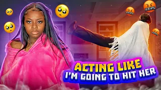 Acting Like Im Going To Hit Her To See How She Reacts! *VERY BAD IDEA*