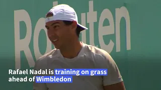Rafael Nadal trains on grass as he 'intends to play' at Wimbledon   AFP