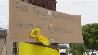 Saying 'thank you' to healthcare workers and first responders with yellow ribbons