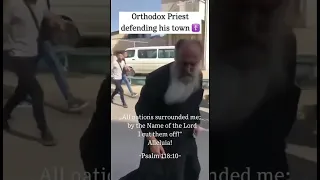 A Priest defending his people from radical Islamist on Christain town in Middle East #christian