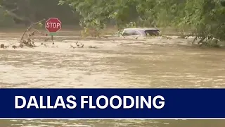 Vehicle stuck in high water near White Rock Lake