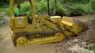 Dozer cleaning up creek