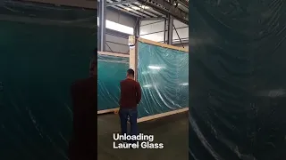 How to load and unload the glass panels from container?