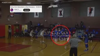 High school basketball coach suspended after viral video shows shoving of player