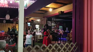 Amy Winehouse at the tiki bar Kalamaki