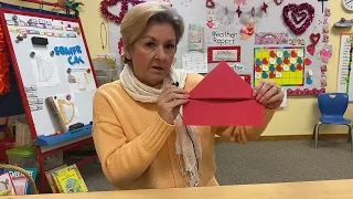 Folded paper cross