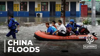 China's typhoon Doksuri triggers alert amid floods & landslides