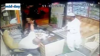 CCTV video: Brave man saves shopkeeper from deadly assault