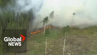 BC wildfires: Firefighters working hard on fire guard in case winds switch again