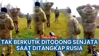 Seorang Pasukan Rusia Kawal Tiga Tentara Ukraina yang Ditangkap di Zaporozhye