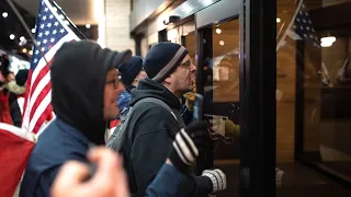 Justin Trudeau swarmed by group of 'angry' protesters as he walked into Hamilton restaurant