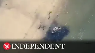 Moment Ukraine bombs Russian landing boat as sea war intensifies