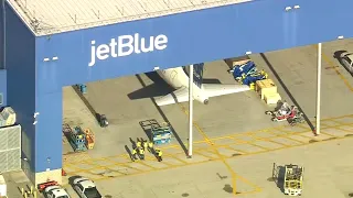 JetBlue plane bumps into another aircraft in JFK Airport's gate area