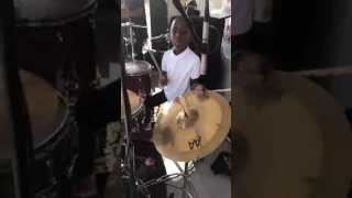 8 yrs old kid haitian  drummer
