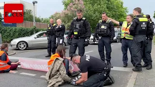 Klimaprotest auf Berliner Straßen: Aktivisten von „Letzte Generation“ kleben sich am Boden fest