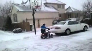 DRIFTING in SNOW on mini ATV