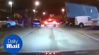 Dashcam captures police car chasing car thief in Manchester - Daily Mail