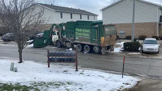 Waste Management Front Loader dumping overloaded 10 yard dumpster with flaps closed!