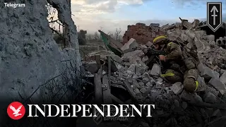 Ukrainian troops move through destroyed Donetsk settlement as Kyiv announces recapture