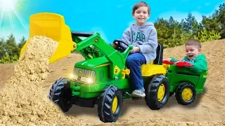 Children assembled and fixed the tractor John Deere | Toys 2 Boys